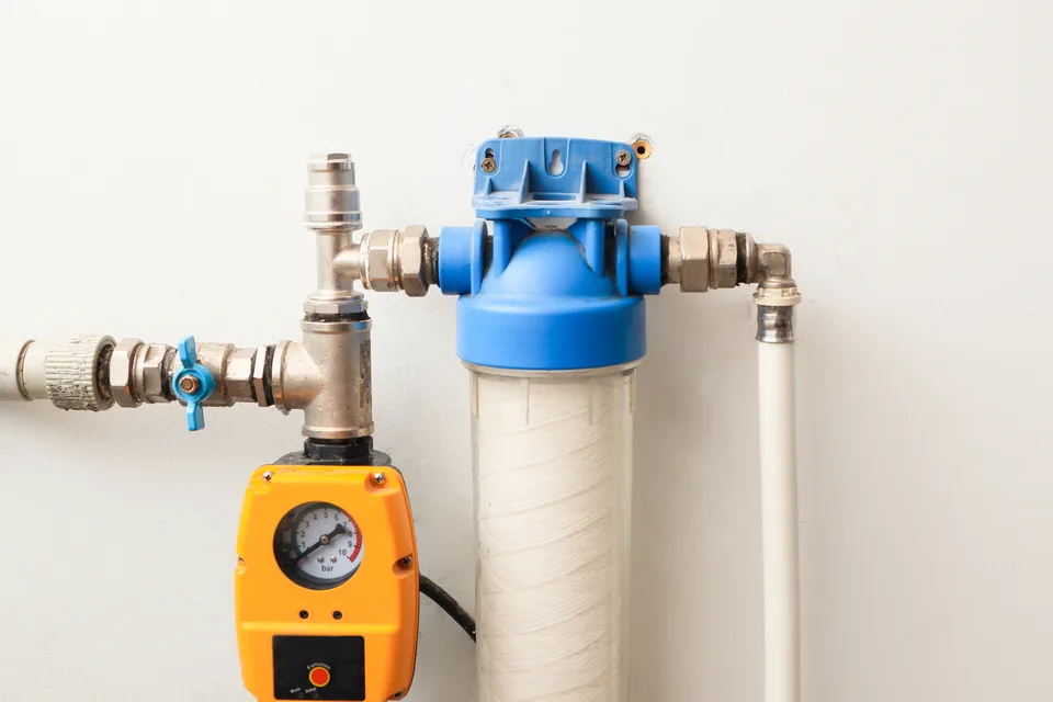 Water-supply pressure controller, filter and connected pipework